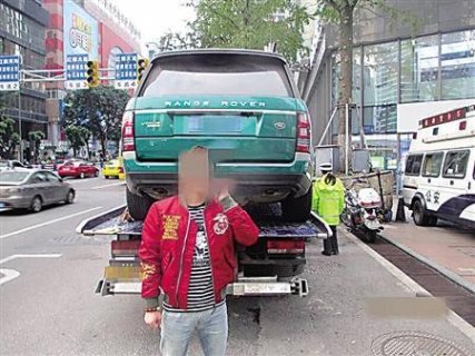 路虎车身私自改成绿色 “保护色”无用被罚2200元